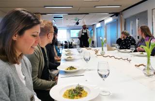 People discussing in lunch table.